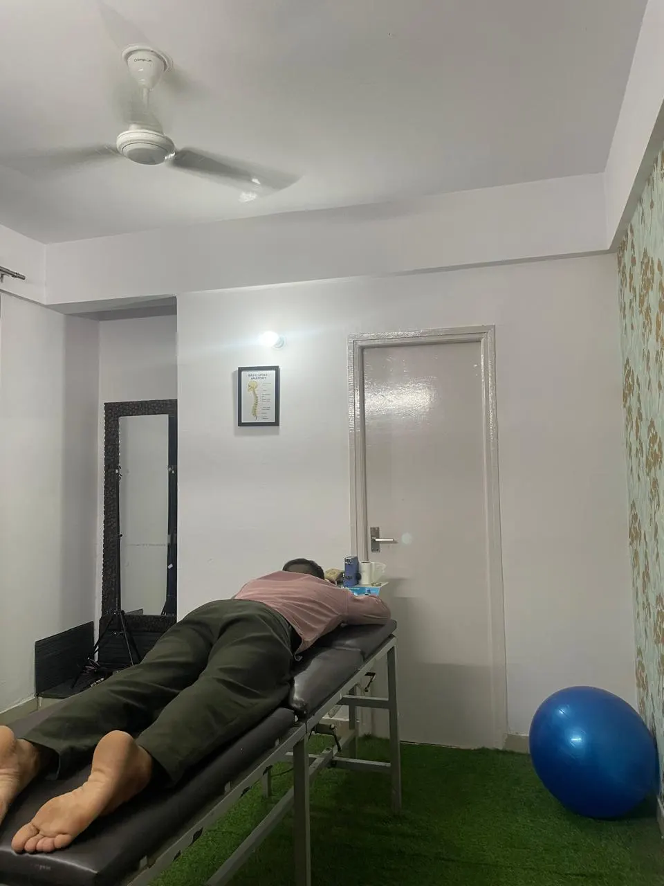 Patient receiving physiotherapy on a treatment table